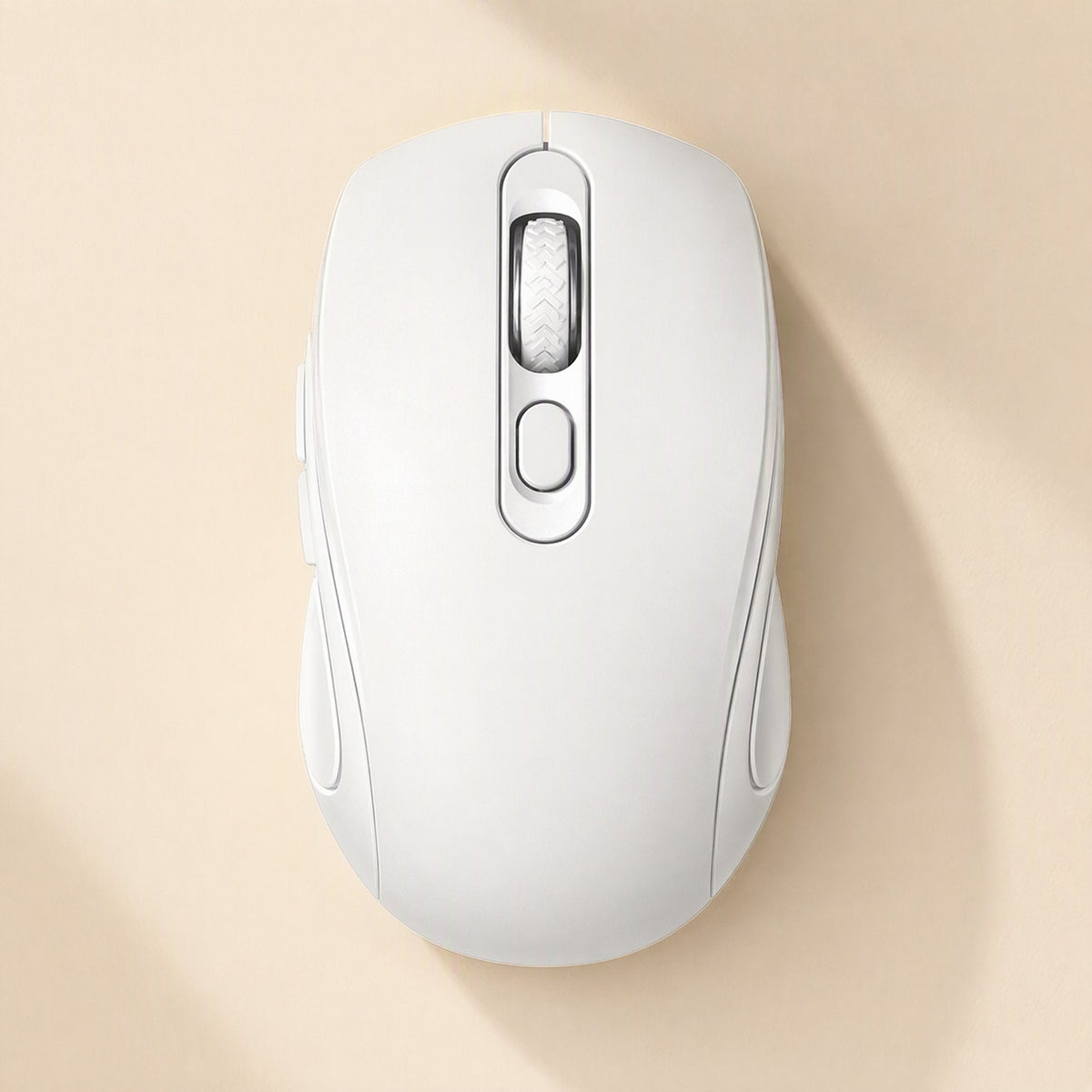 Voiceglide – White wireless mouse top-down on a cream backdrop, with ridged scroll wheel and round button
