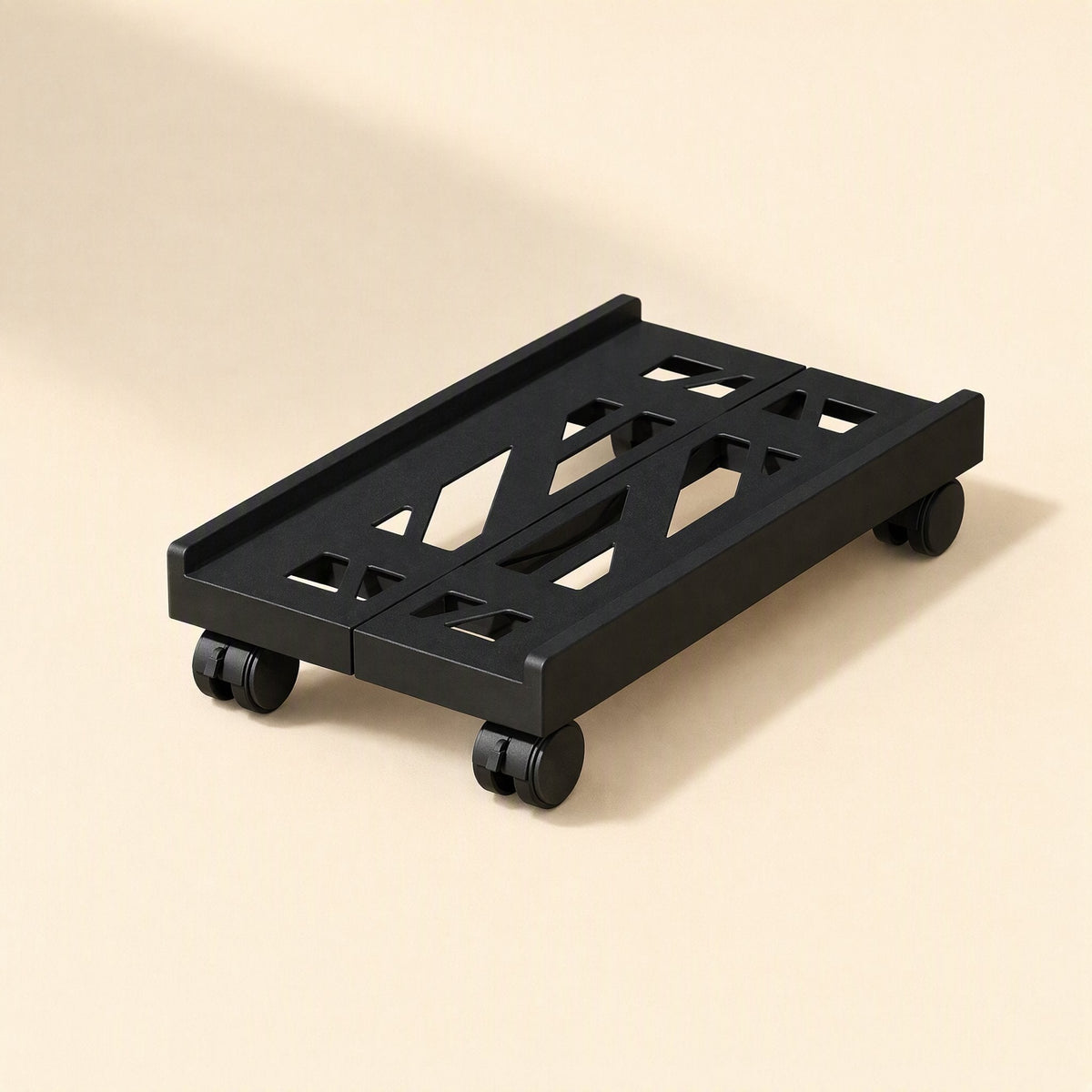 Slidecaddy – Black wheeled base at a slight angle on a cream background, showing its cutout deck and casters