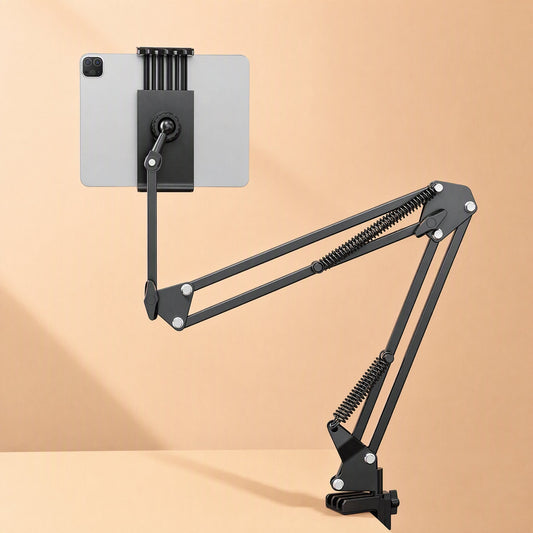 Hoverrest – Black spring-arm stand clamped to a desk, holding a tablet upright at the end of a long extended arm