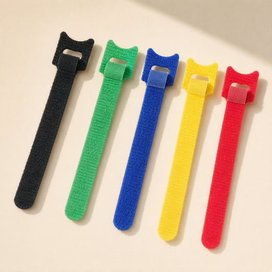 Loopmate – Five colourful hook-and-loop cable ties in black, green, blue, yellow and red, laid out vertically