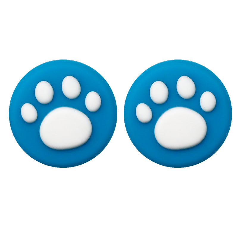 Clawbit – Pair of blue silicone joystick caps with white cat paw prints, shown side by side on a white background