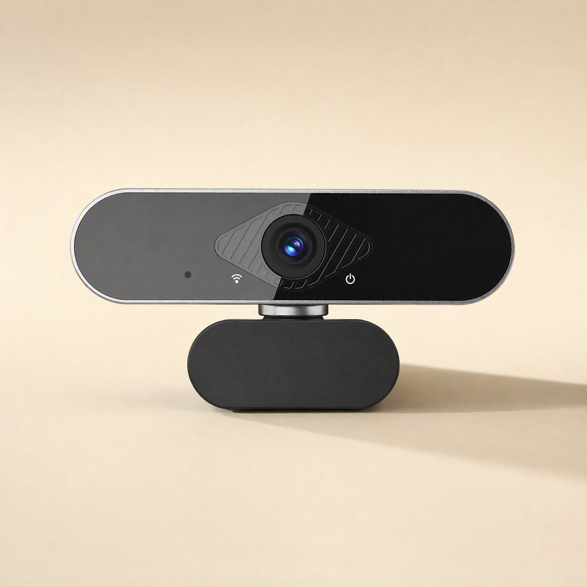 Faceview – Straight-on view of the webcam showing its glossy black face, silver rim, microphone dot and Wi-Fi style icon