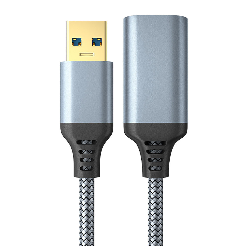 Flexwire – Close-up of male and female USB 3.0 connectors with gold plating and gray metal housings on braided cables