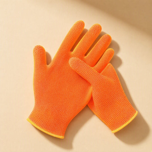 Fingerweave – Pair of bright orange knit gloves with yellow trim laid overlapping on a beige background