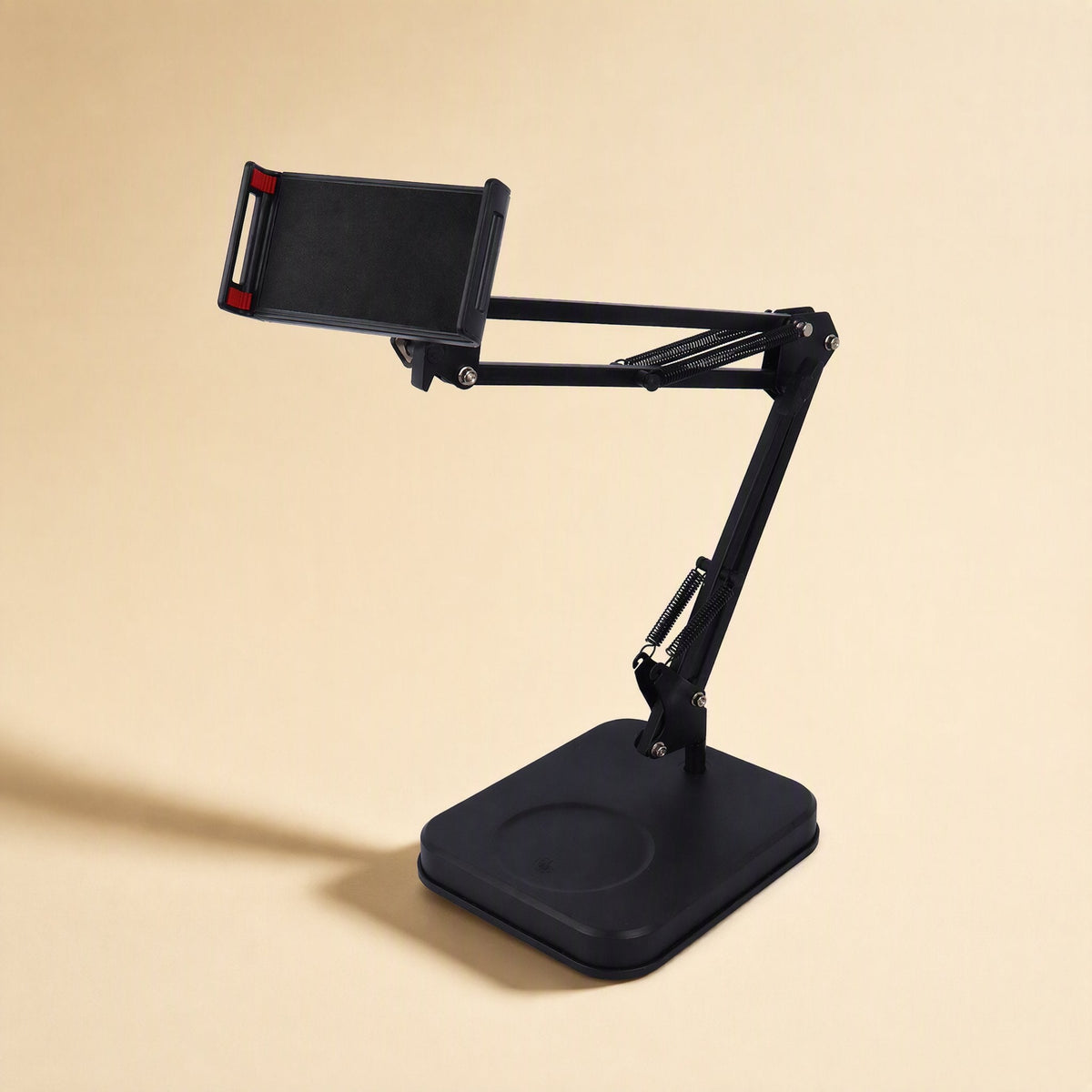 Phonebrace – Black bracket with square base holding a tablet-size clamp with red grip tips on an extended arm