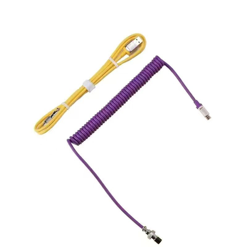 Cablecraft – Purple coiled cable section next to a separate yellow straight cable, both with metal connectors, white