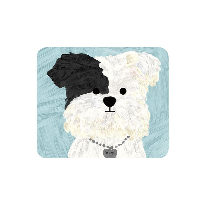 Pupmat – White and black puppy with a heart-shaped tag on a pale blue mouse pad, shown on a plain white background