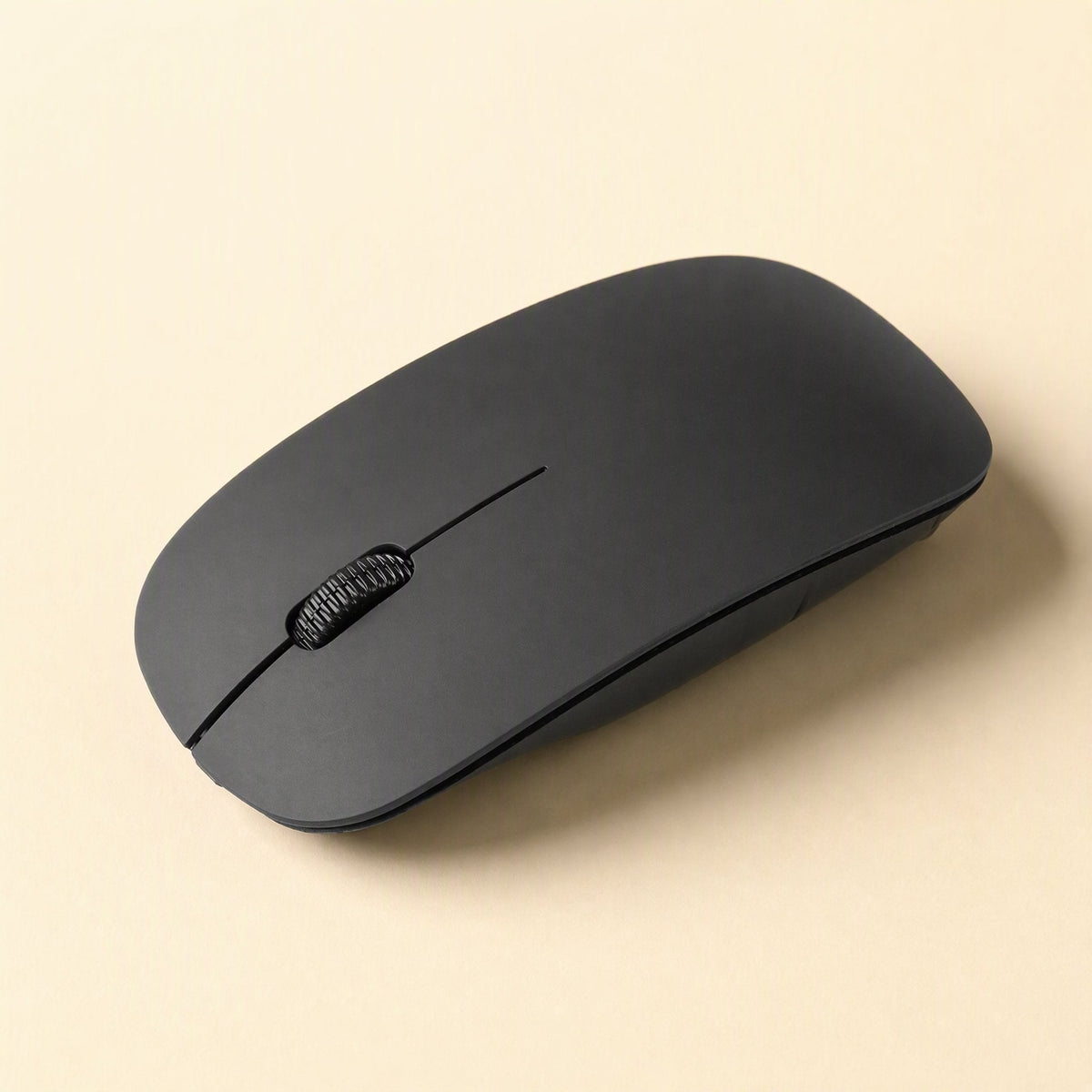 Clickfour USB Wired Mouse – close view of a matte black mouse showing its textured scroll wheel and curved low-profile body