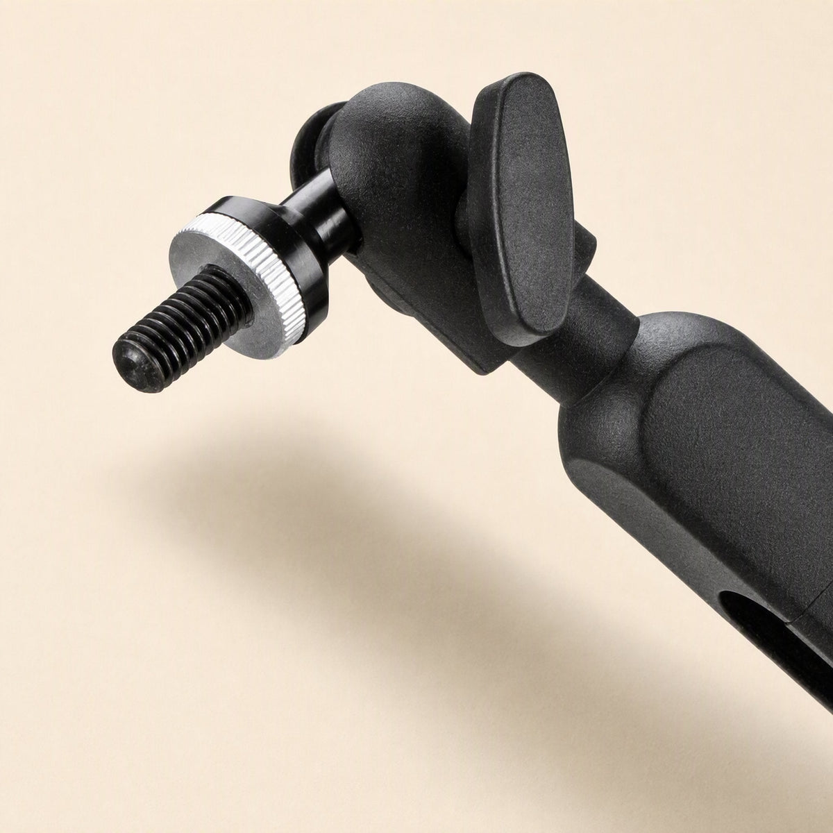 Swingreach – Close-up of the threaded mounting screw and swivel joint with locking knob at the arm's end