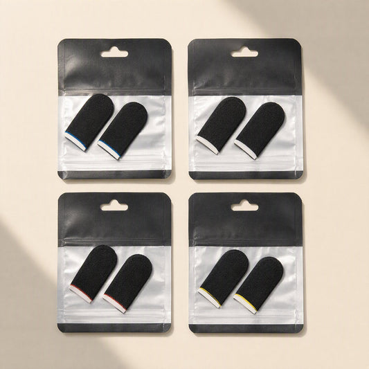 Gamegrip – Four packs of black finger sleeves with blue, white, red and yellow trim in clear zip bags on beige