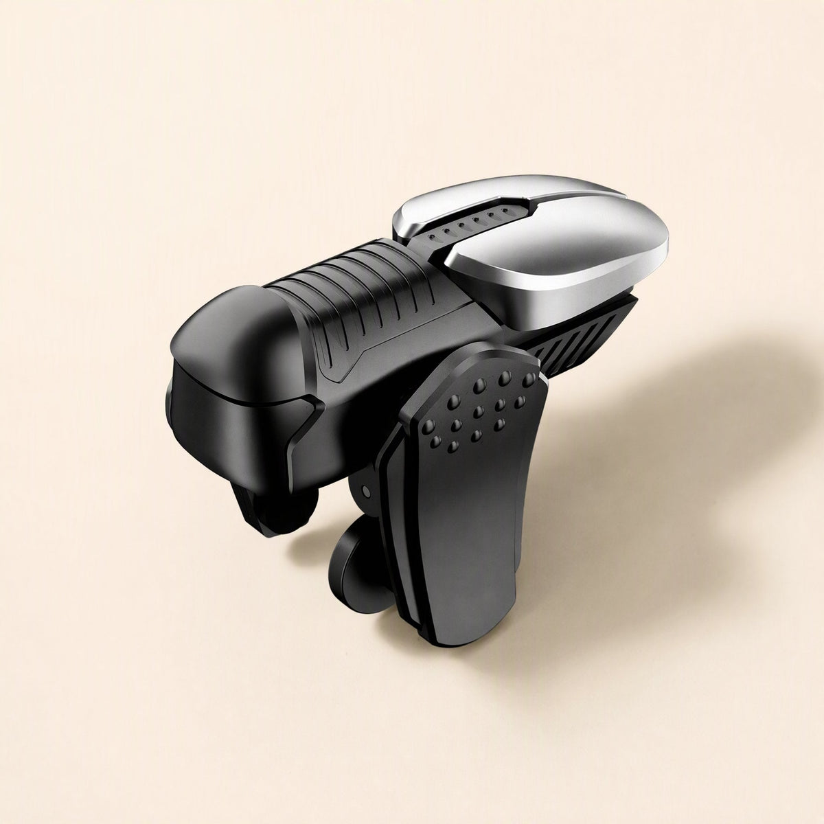 Gameglide – Single black trigger with silver top button and dotted clip, close-up from the side on a cream background