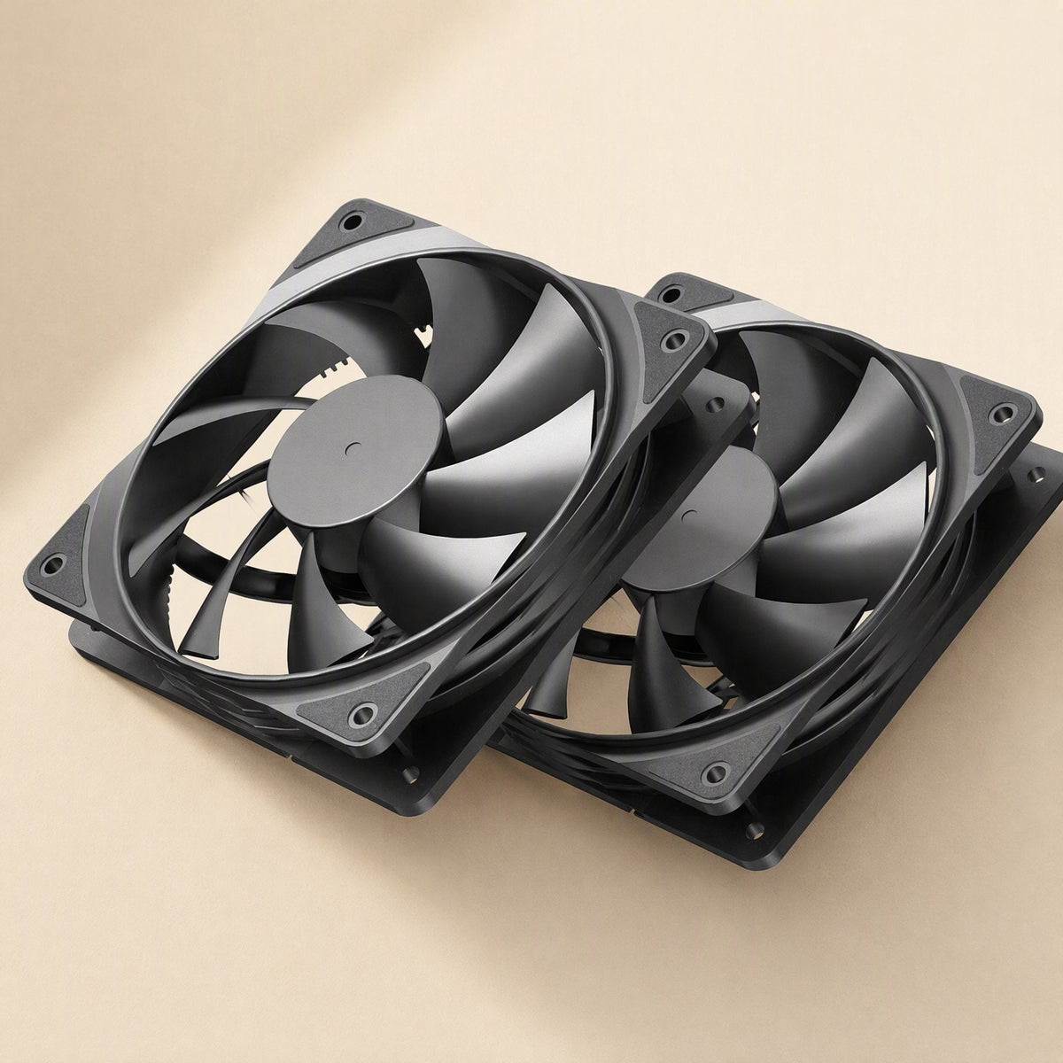 Fanwhisper Desktop Cooling Fan – two black 12cm fans stacked at an angle, showing the blades and mounting corners