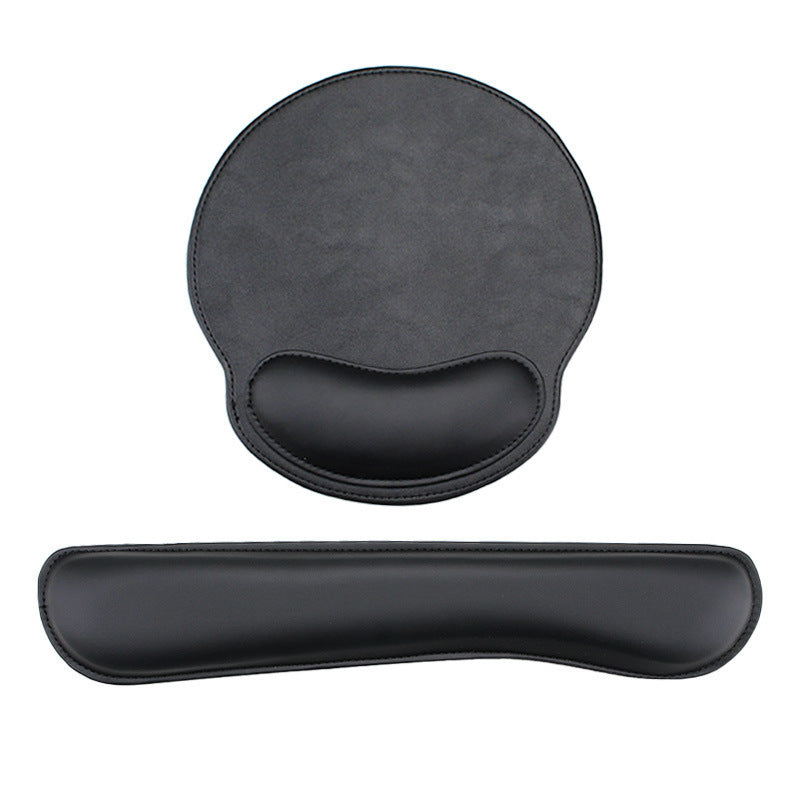 Wristcradle – Black leather round mouse pad with curved wrist rest above a matching long keyboard wrist rest, white