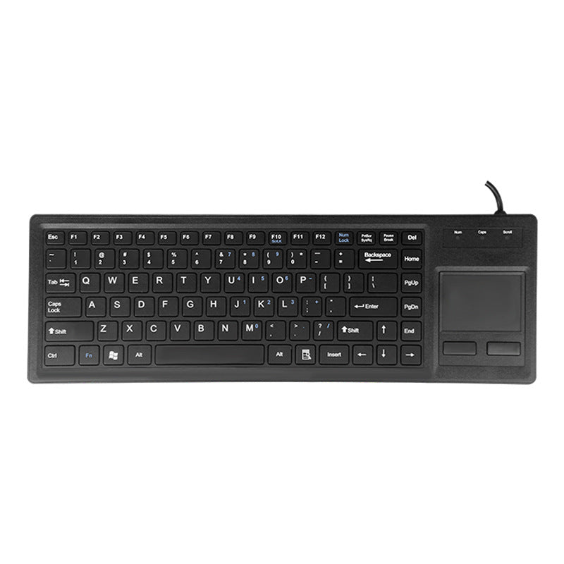 Keytrack – Top-down view of the full black keyboard with right-side touchpad and cable at top right