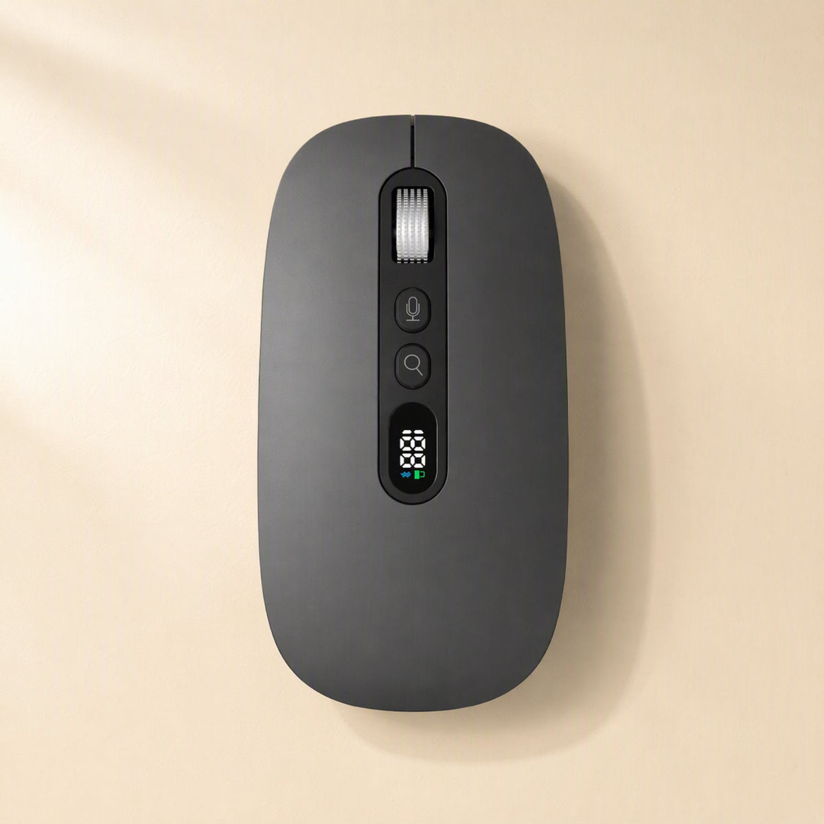 Speakclick – Black voice mouse on a cream background, top view with scroll wheel, mic and search buttons and digital display