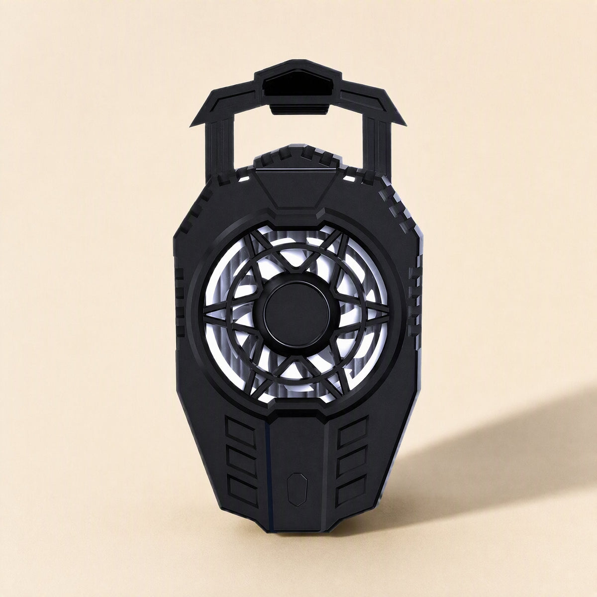 Frostdial – Front view of the black phone cooler with star-pattern fan grille, ridged edges and power button, no lighting
