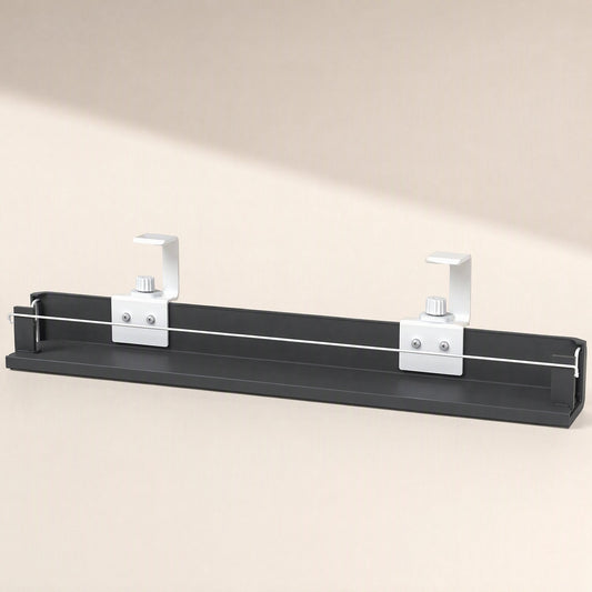 Cordtray – Black cable tray with two white clamp brackets and a white wire across the front, shown from above at an angle