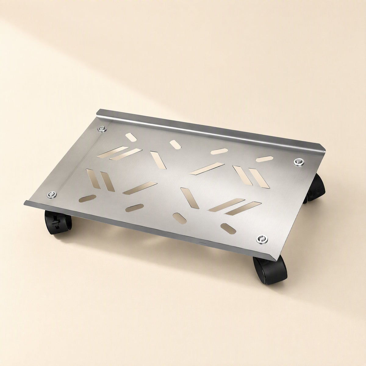 Towerhold – Stainless steel bracket with decorative slot cutouts, rivet details and black casters on a light surface