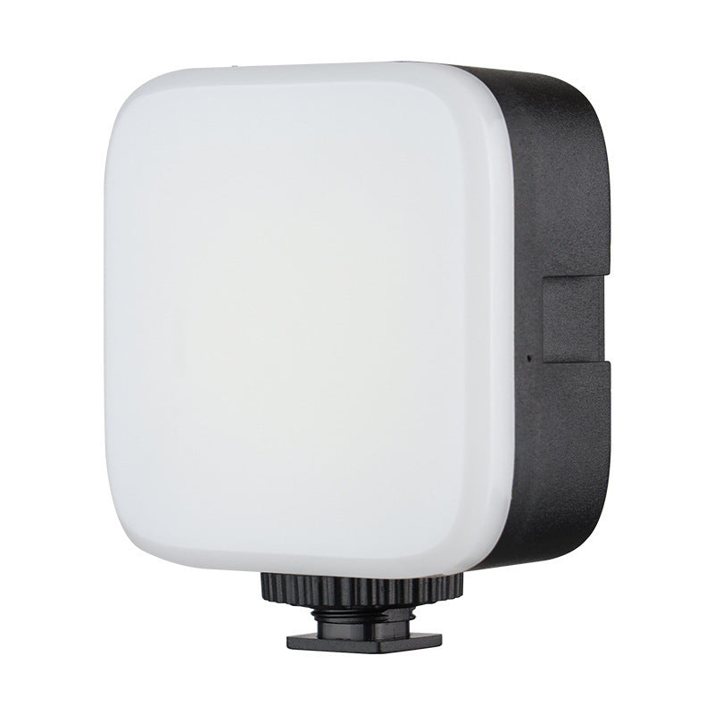 Selfbeam – Front diffuser panel of the white square LED light on a black body with a cold shoe mount at the bottom