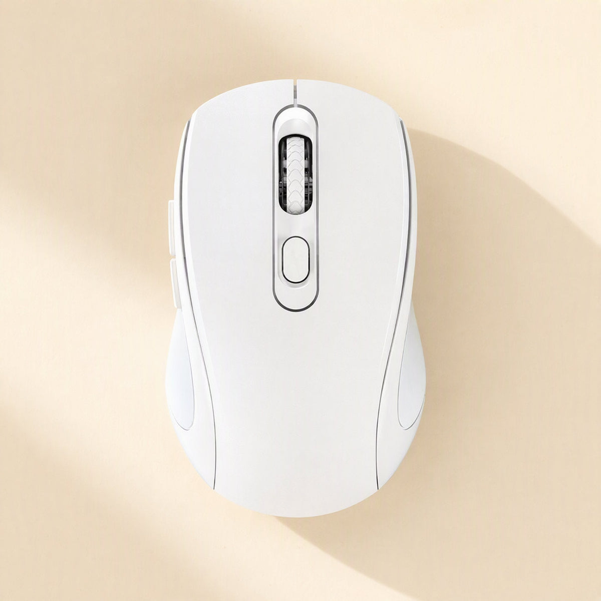 Voiceglide – White wireless mouse seen from above, with scroll wheel and round button on a beige background