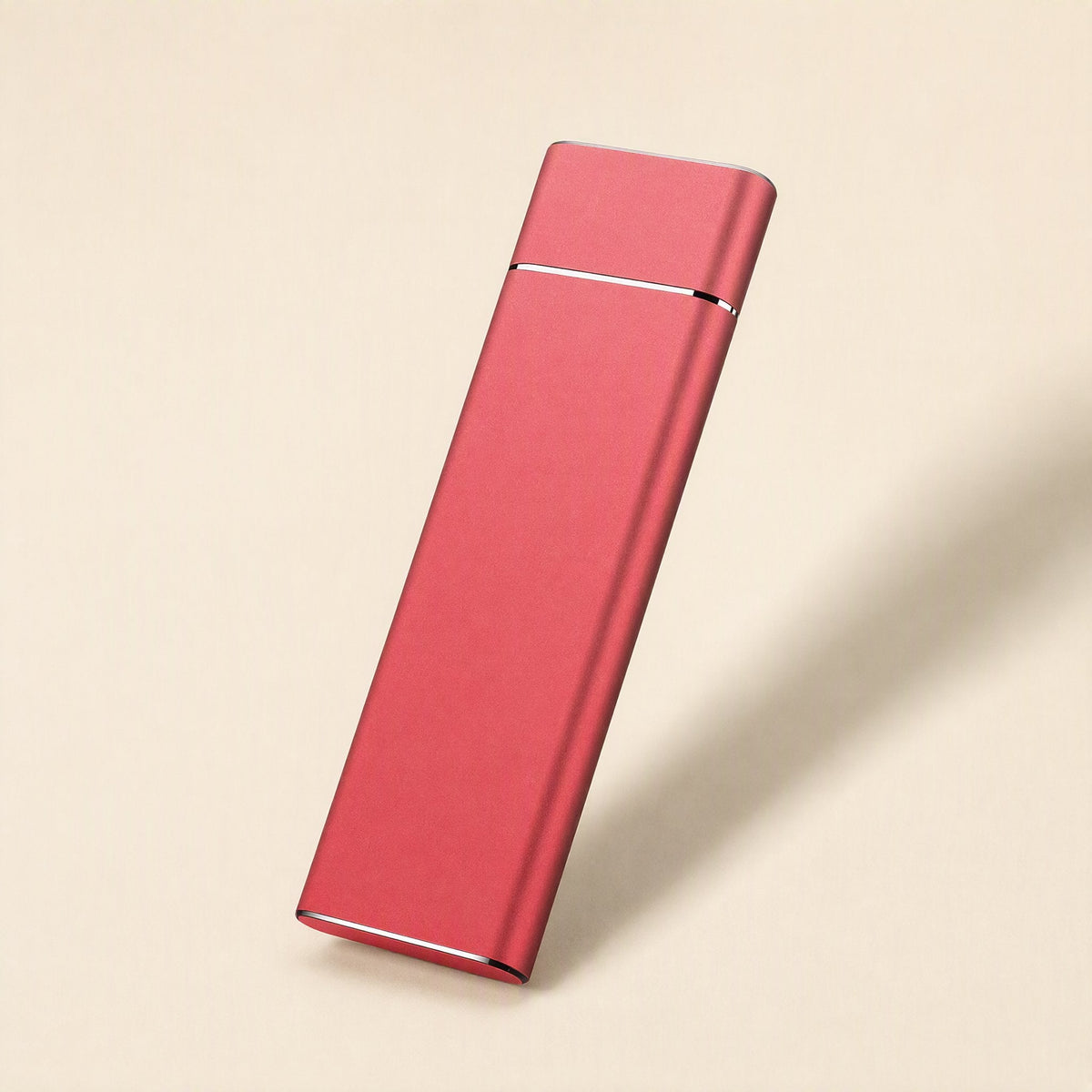Driveforge – Red slim metal drive leaning upright against a cream background, with a thin metallic edge line