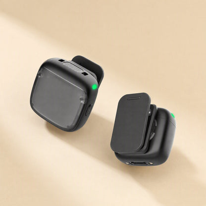 Noisehush – Two transmitters shown from front and back, with clips, green lights and a charging port