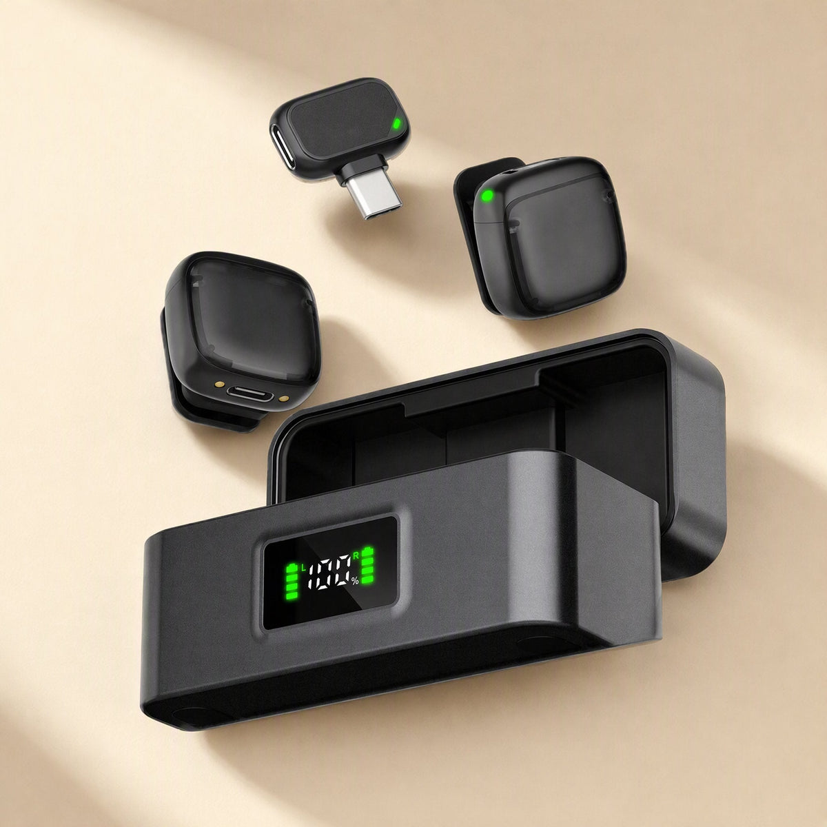 Noisehush – Charging case with percentage display, two transmitters and the USB-C receiver on a beige surface