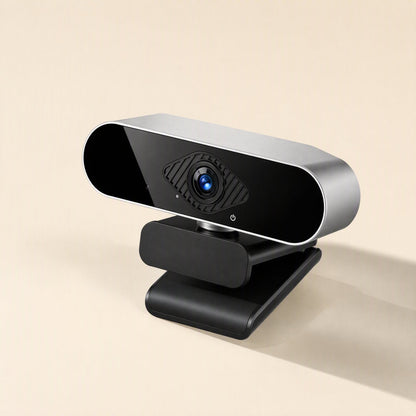 Viewvoice – Black webcam with silver edge and blue-tinted lens, shown from a slight angle on a cream background
