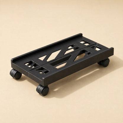Slidecaddy – Top-down angled view of the black rack with geometric cutout pattern and four swivel casters