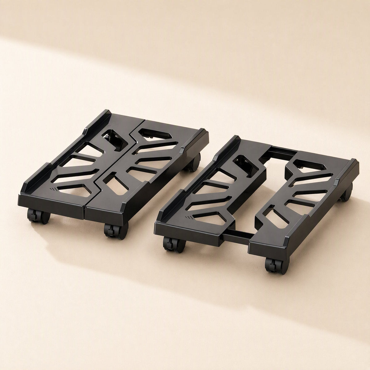 Towerbase – Black tower stand halves pulled apart, showing the connecting rails and cutout pattern