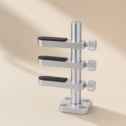 Alloyrise – Three silver graphics card stand posts with rubber-padded arms and knurled screws, side by side on a cream