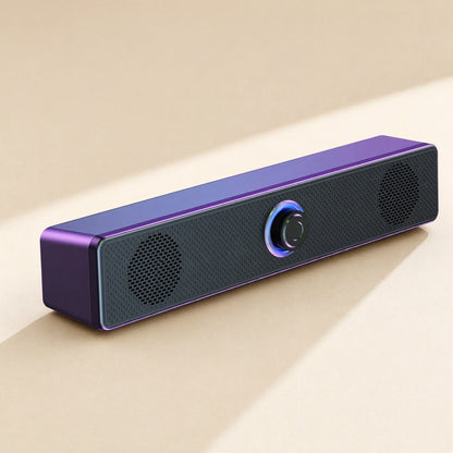 Wiretune Wired USB Bluetooth Speaker in purple, angled view of the soundbar with glowing blue ring knob