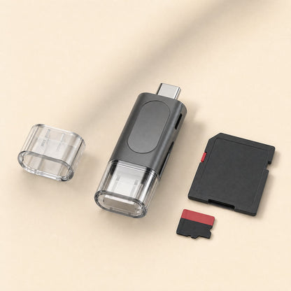 Quickslot – Card reader with USB-C plug exposed, clear cap off, shown next to a full-size SD card and a microSD card