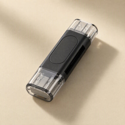 Quickslot SD TF Card Reader – black card reader with clear caps fitted on both ends, shown from above on a beige surface