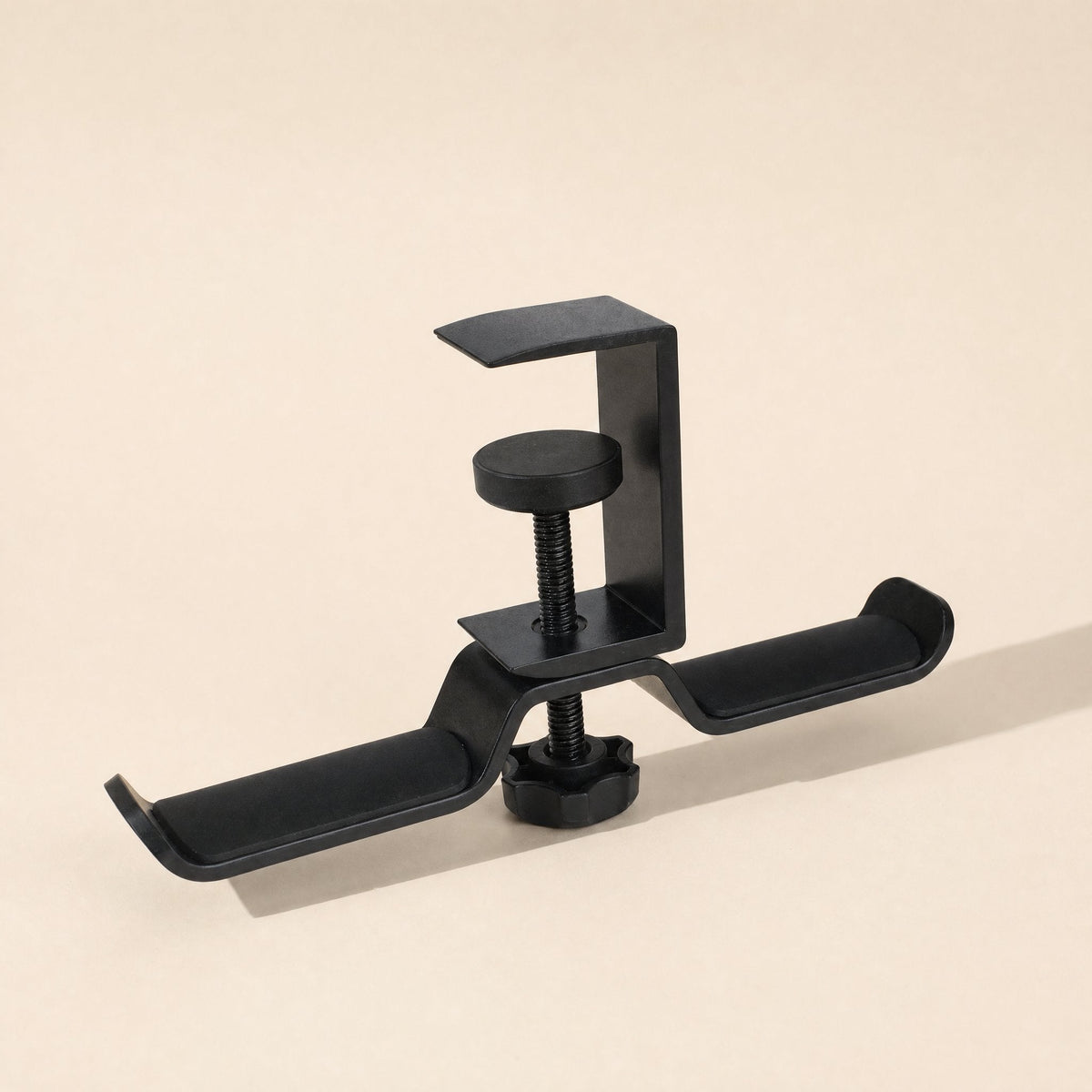 Aluturn Headphone Stand – black clamp stand viewed from a lower angle, showing the screw and the two cushioned arms
