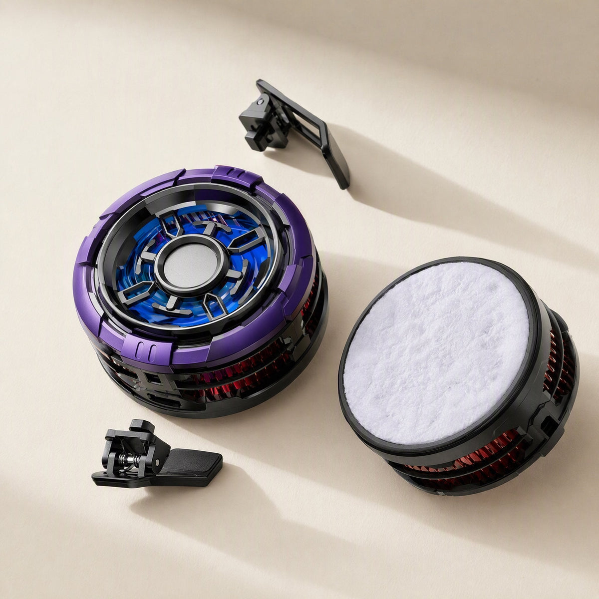 Coolflow – Purple and black cooler with blue fan, plus a detached clip and a cooling pad with white plush cover