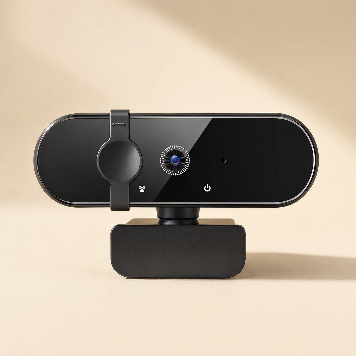 Pixelsharp – Front-on view of the black webcam showing the lens, microphone, power icon and privacy cover on its stand