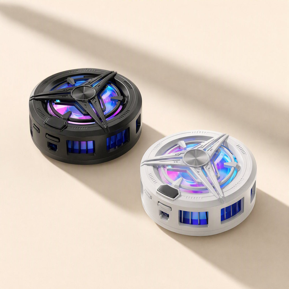 Magfreeze – Black and white coolers side by side on a beige surface, showing side vents, button and glowing center