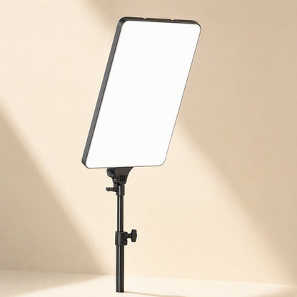 Softbeam – Rectangular fill light panel on a black telescoping pole with adjustment knobs, in soft diagonal light