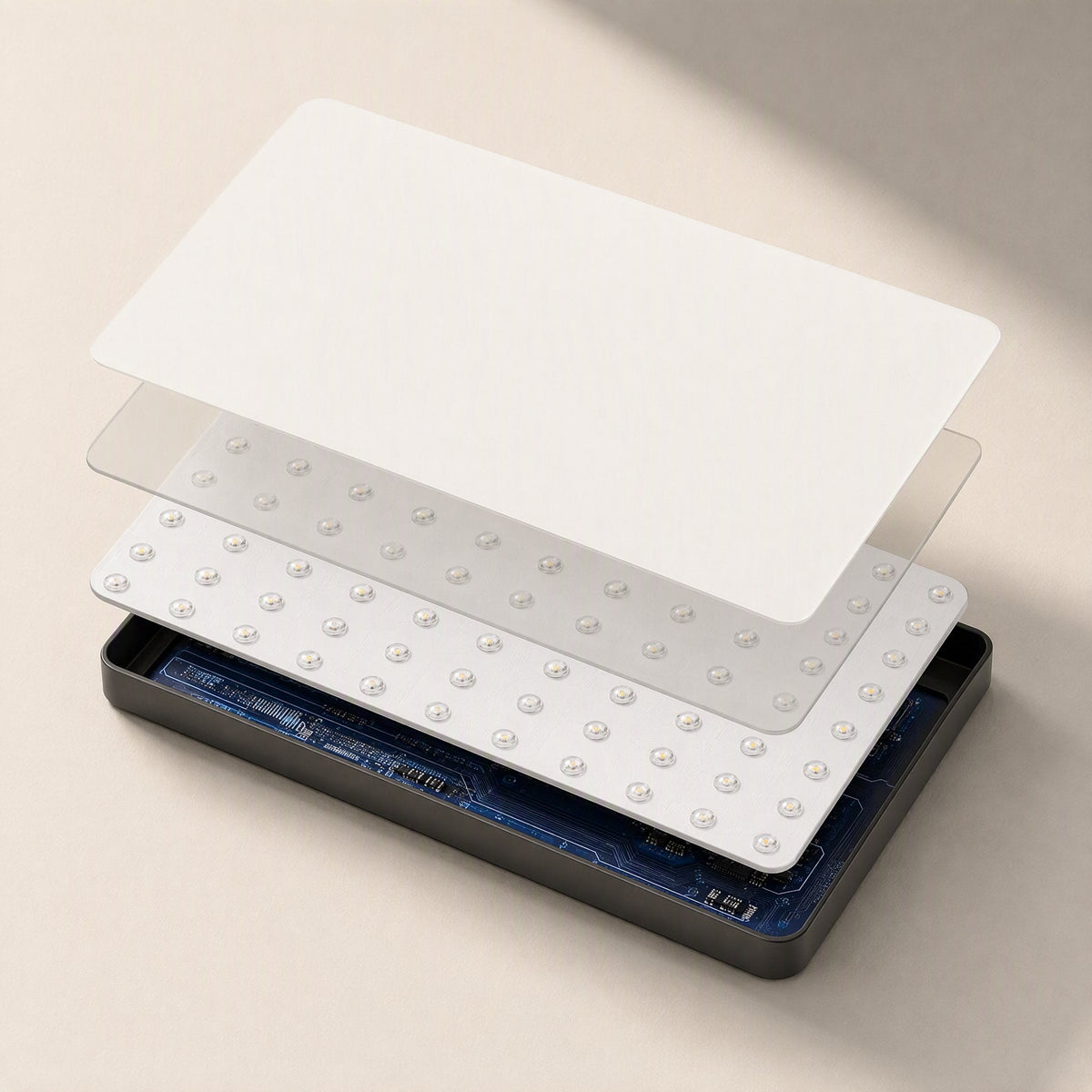 Softbeam – Exploded view of the panel showing diffuser sheets, LED bead board and circuit board in the black casing