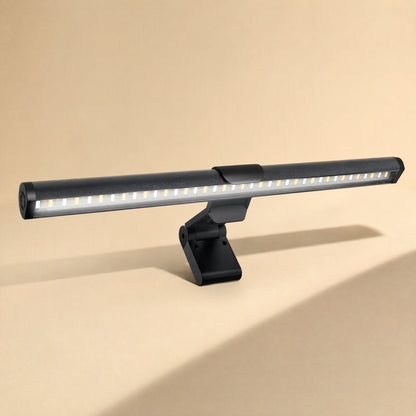 Metalgleam Metal Computer Screen Hanging Light with warm LED strip lit, angled front view on beige backdrop