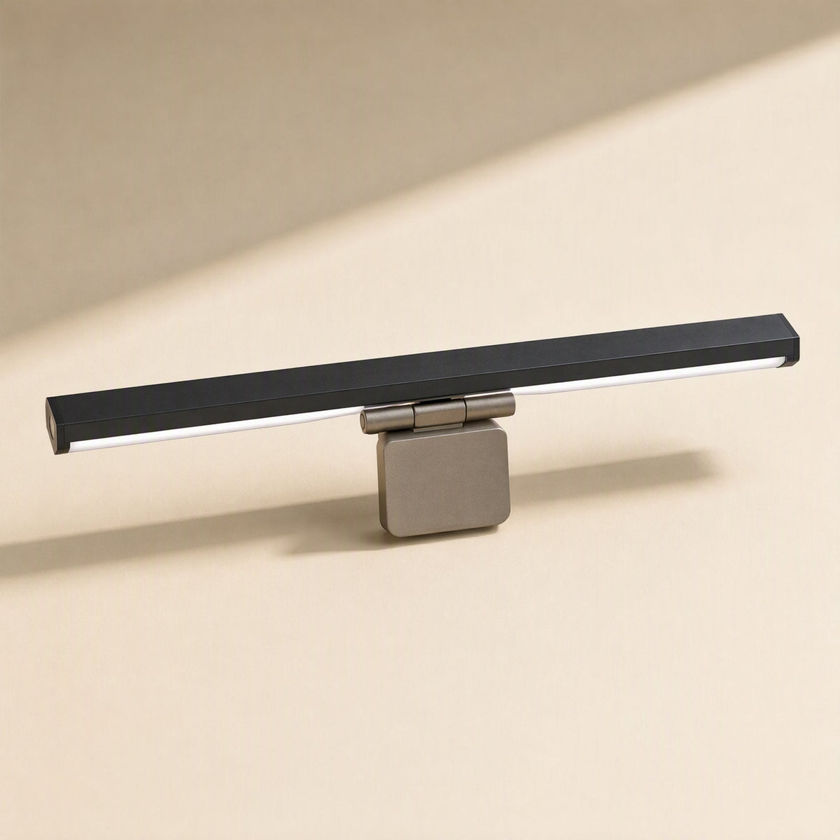 Metalgleam – Light bar from the front with a silver-toned clip and hinge, strip glowing white underneath