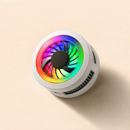 Frostchip – White round phone cooler with glowing rainbow fan, shown from a three-quarter angle with side vent slots