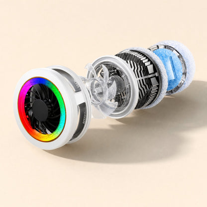 Frostchip – Exploded view of the cooler's layers: RGB fan, clear housing, heat sink fins, blue cooling pad and fabric ring
