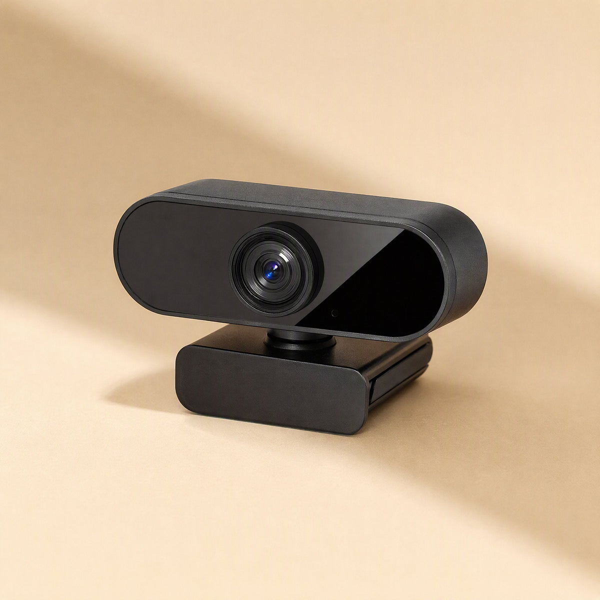 Viewbeam – Black webcam seen from a left three-quarter angle, with a glossy panel beside the lens on a peach background