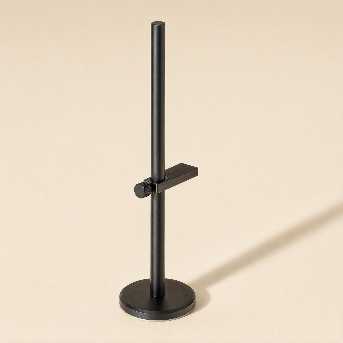 Alloybrace Graphics Card Bracket in black with one adjustable arm and thumbscrew on a round base