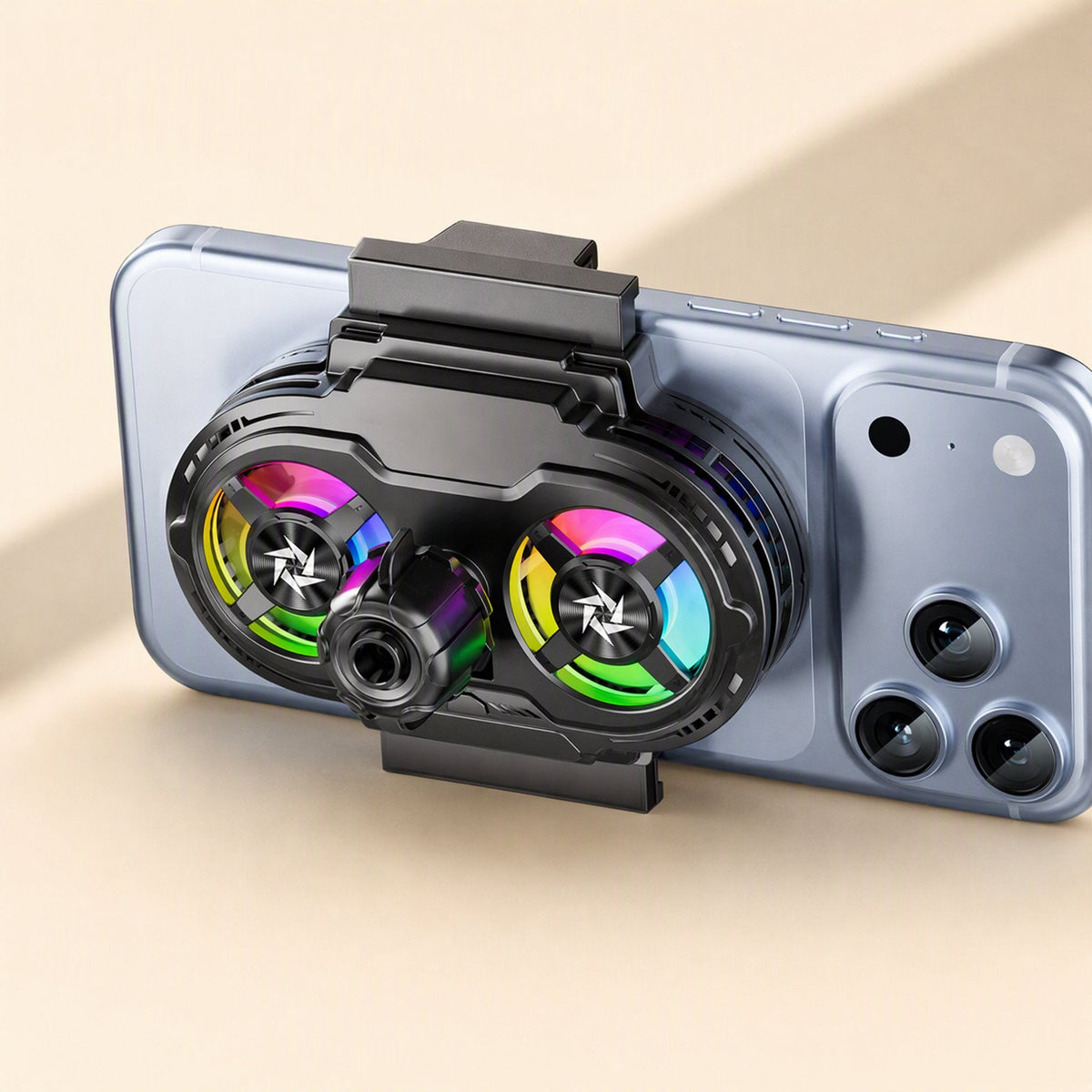 Chillview – Black dual-fan phone cooler mounted on a phone held sideways, with rainbow-lit fans and a black side knob