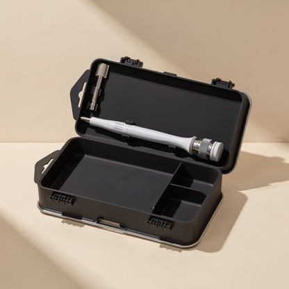 Screwkit Precision Screwdriver Set open on a beige surface, with a white pen-style driver in the black case lid