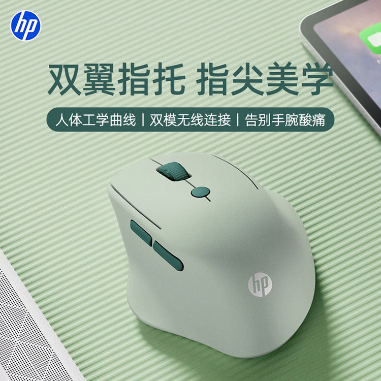 Restclick Wireless Optical Computer Mouse in sage green on a matching green desk mat beside a tablet