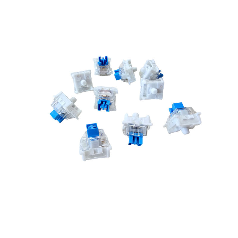 Crispop – Ten white pinless blue switches scattered at different angles on a white background